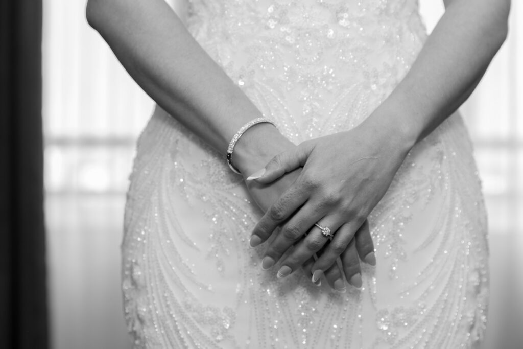 A closeup detail shot of the bride's wedding ring.