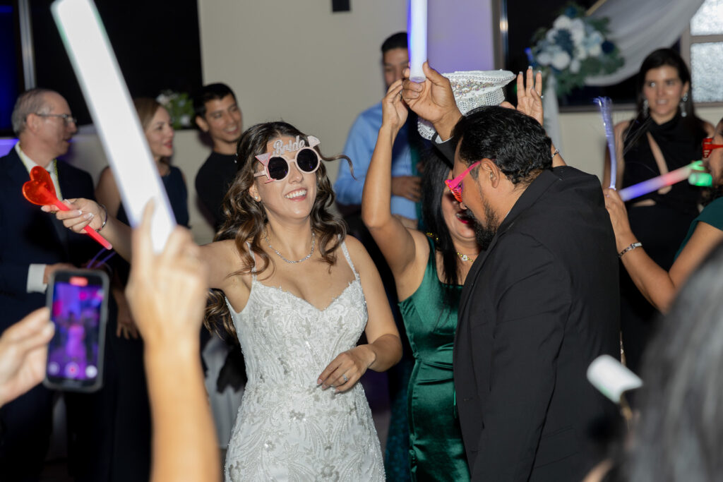 The bride dancing during the wedding reception.