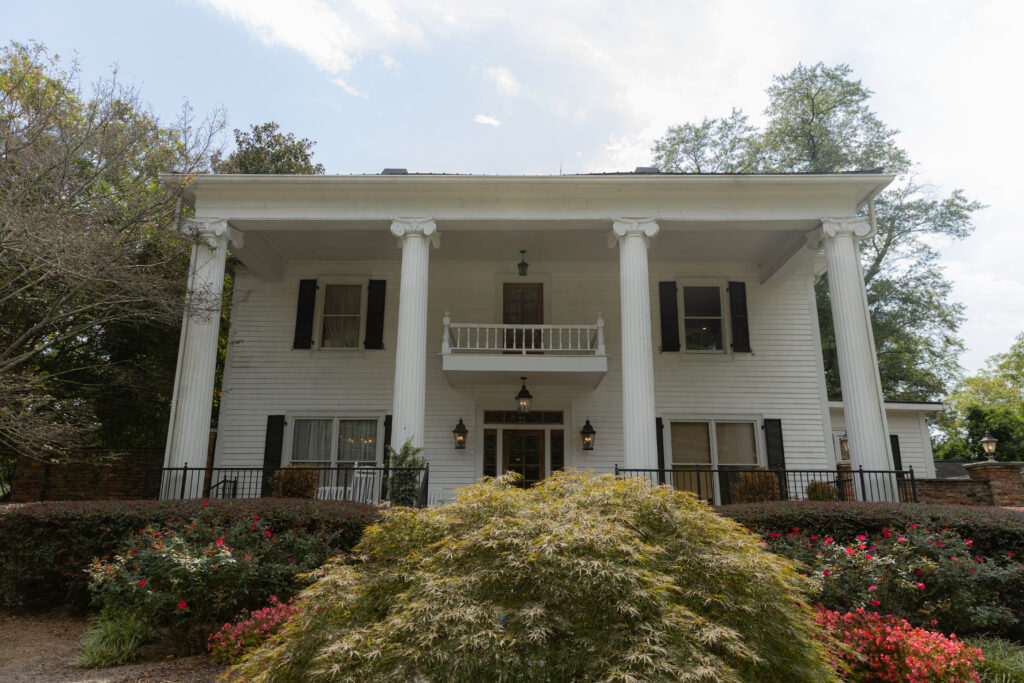 The Carl House historic Southern estate building, front view.